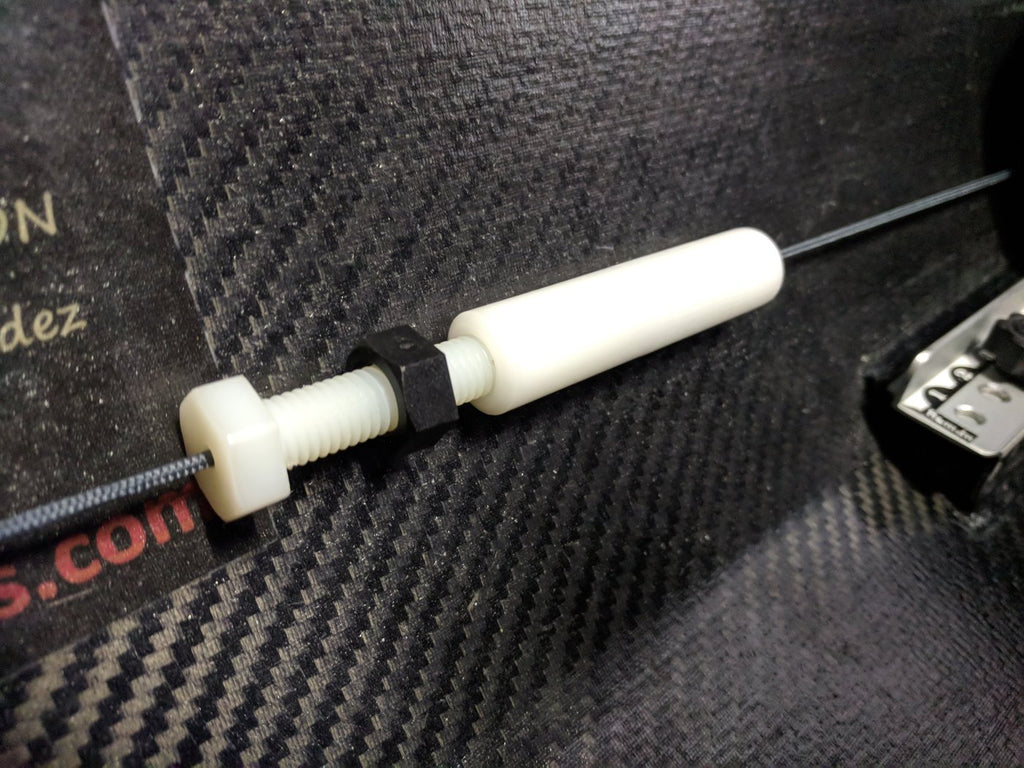 Rudder cable tensioners